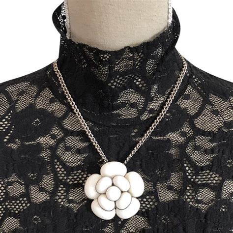 fleurs chanel|Chanel flower necklace.